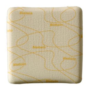 Quadratischer Verband mit gelben Mustern und Schriftzug Biatain.