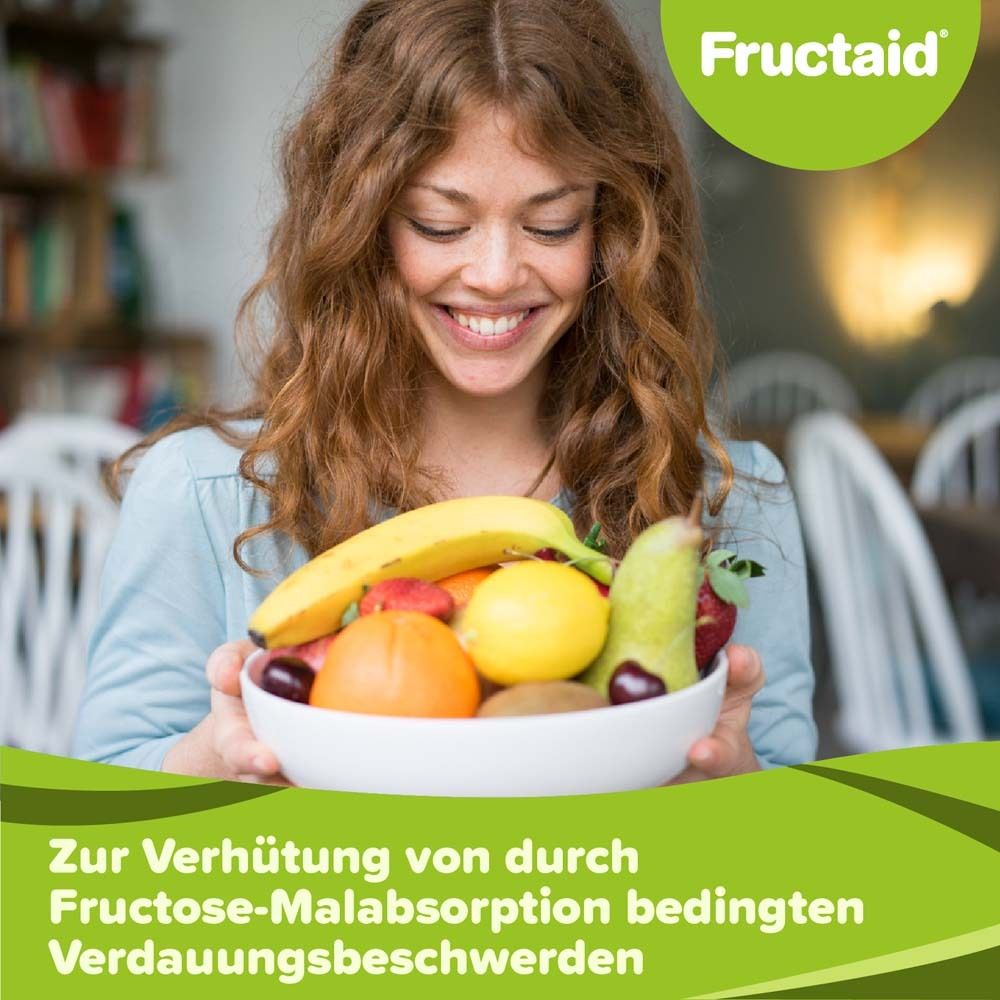 Frau hält eine Schüssel mit Früchten. Fructaid-Logo oben rechts. Text unten: 'Zur Verhütung von...'.