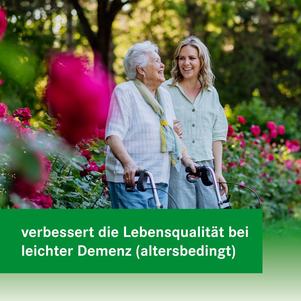Frau mit älterer Frau im Garten. Text: verbessert die Lebensqualität bei leichter Demenz (altersbedingt).