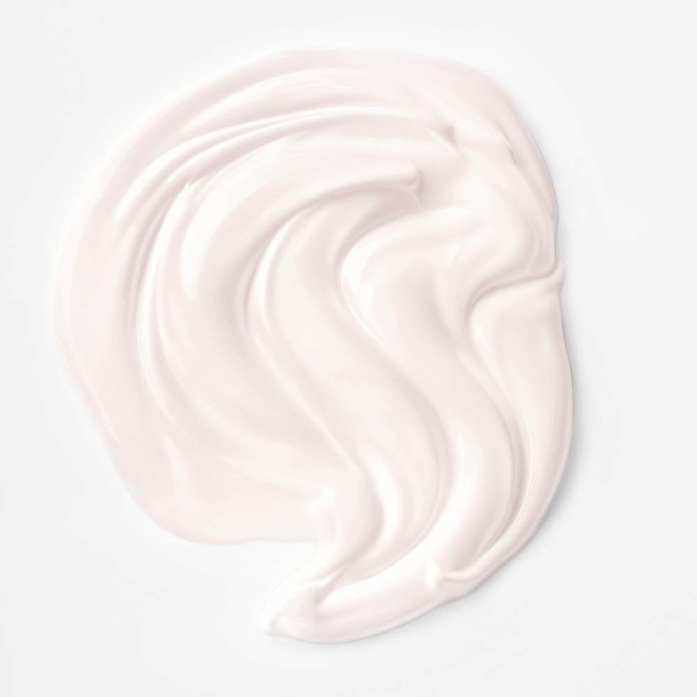 Creme-Klecks auf weißem Grund. Rosa Farbton. Glatte Textur.