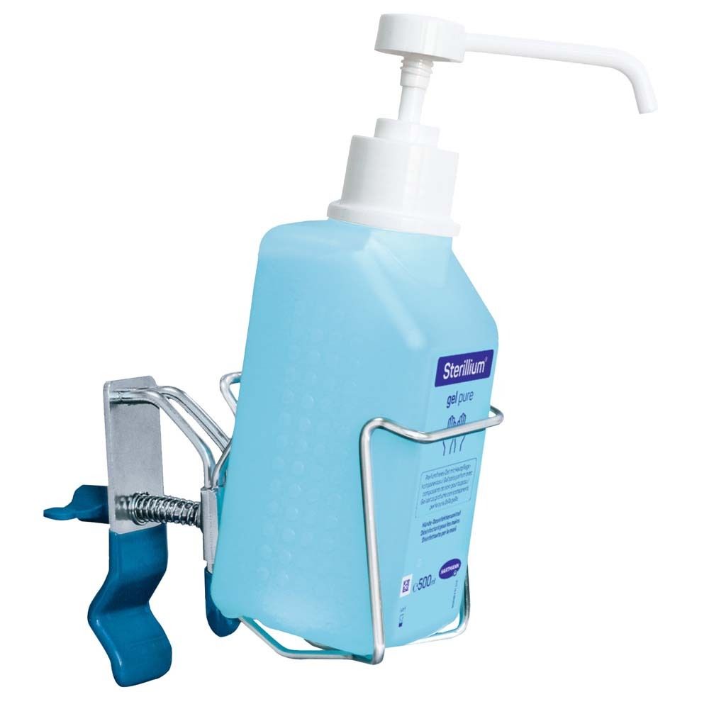 Blaues Fläschchen mit Spender in Halterung. Aufschrift Sterillium gel pure. Halterung mit Klemme.