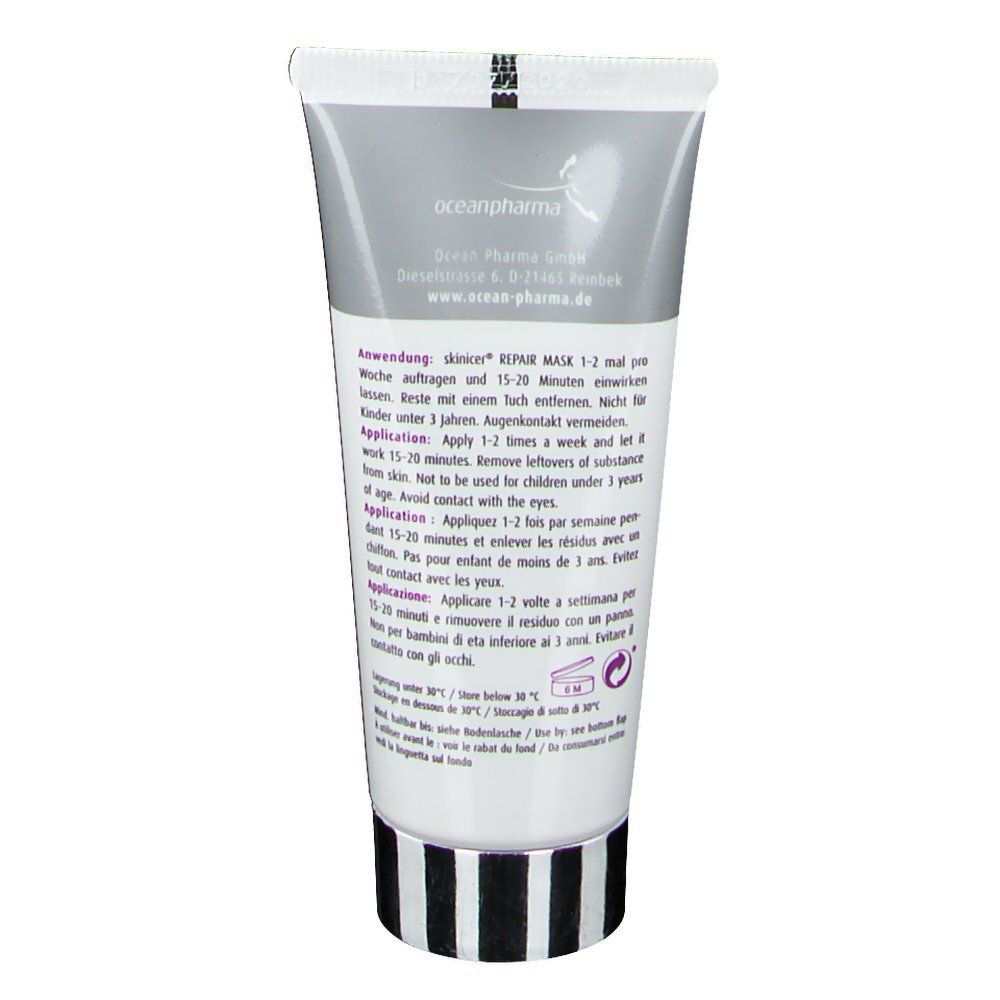 Rückseite der Tube skinicer® Repair Mask. Text: Anwendung, oceanpharma. Schwarzer Ring am Boden. Warnhinweise.