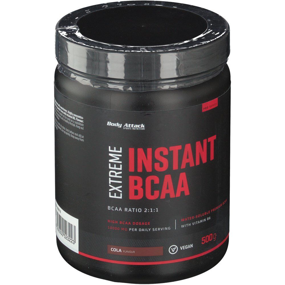 Schwarze Dose mit roter Aufschrift 'Body Attack Extreme Instant BCAA Cola'. Vegan-Siegel und 500g-Angabe.