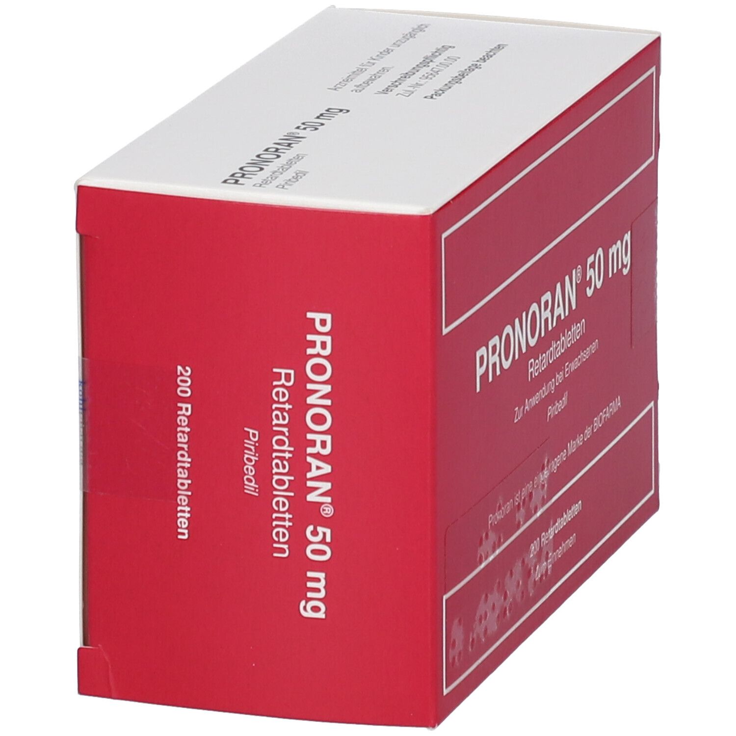 Schrägansicht der Verpackung von Pronoran 50 mg Retardtabletten. Rote und weiße Schachtel mit Produktinformationen.