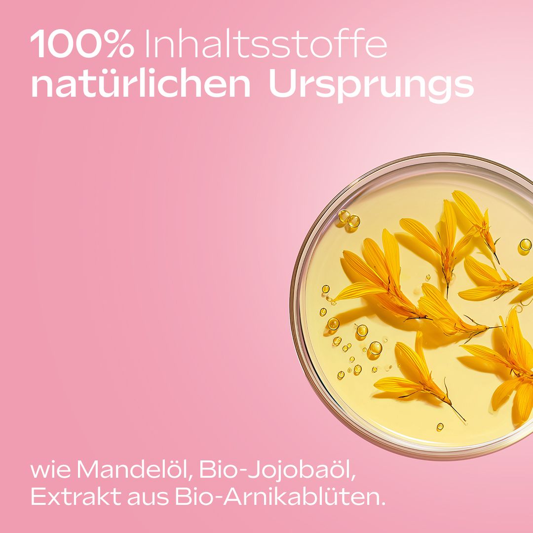 Schale mit gelber Flüssigkeit und Blüten. Text: 100% Inhaltsstoffe natürlichen Ursprungs.