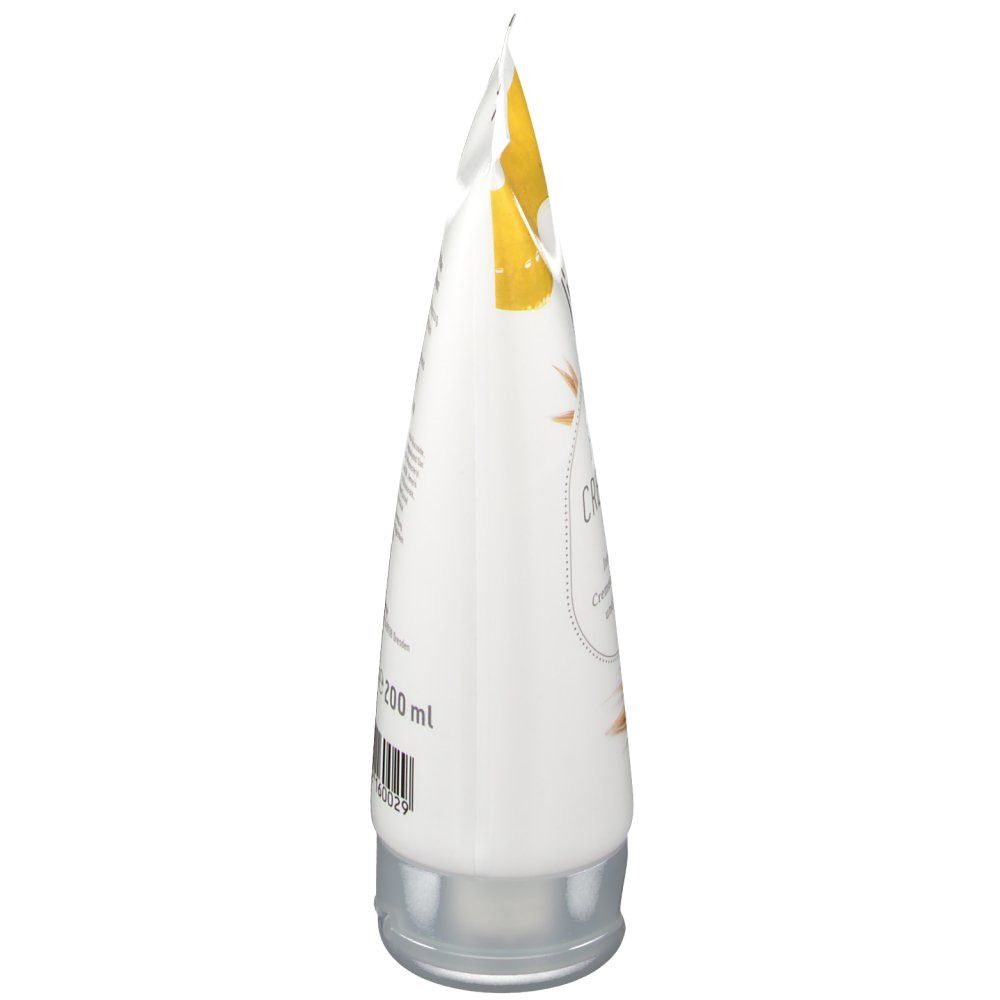 Seitenansicht der Tube. Weiß, mit gelbem Deckel. Aufschrift: 200 ml. Sichtbare Falte.