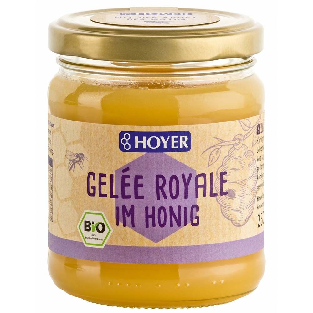 Glas mit Honig und Gelee Royale. Etikett mit Logo, Produktname und Bio-Siegel. Goldfarbener Deckel.