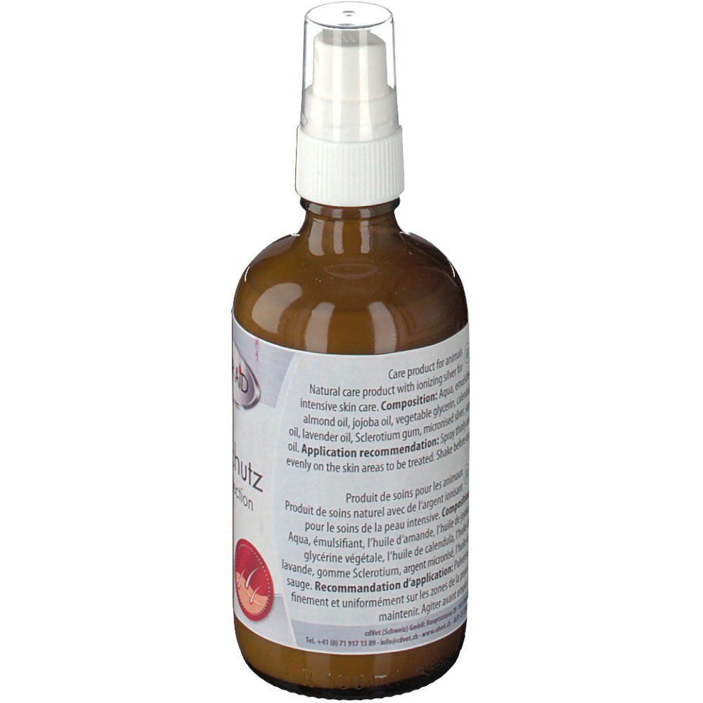 Rückansicht der braunen Glasflasche mit Sprühkopf. Etikett mit Inhaltsstoffen und Anwendungshinweisen in Deutsch und Französisch.