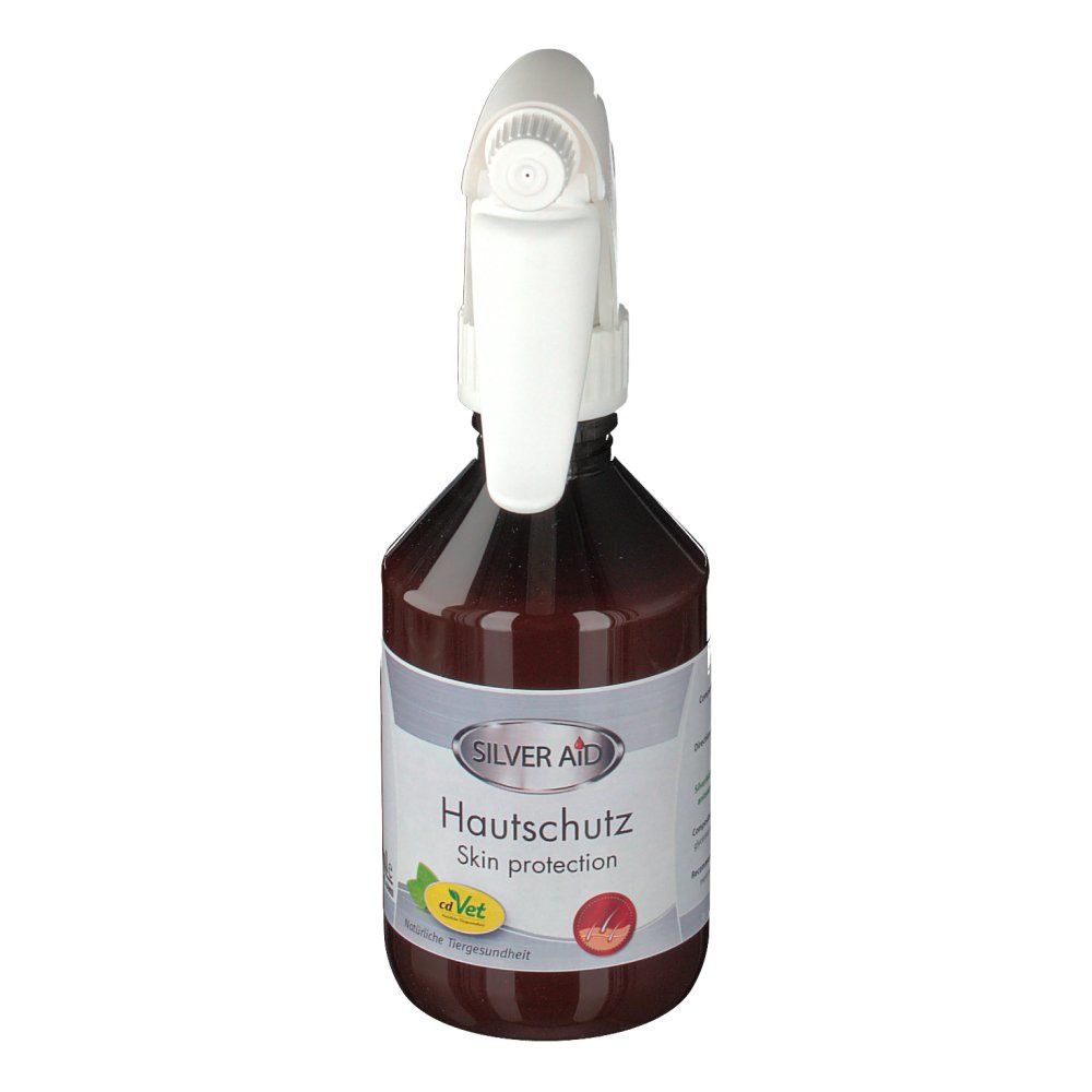 Braune Flasche mit weißem Sprühkopf. Etikett mit "Silver Aid Hautschutz" und "Skin protection".