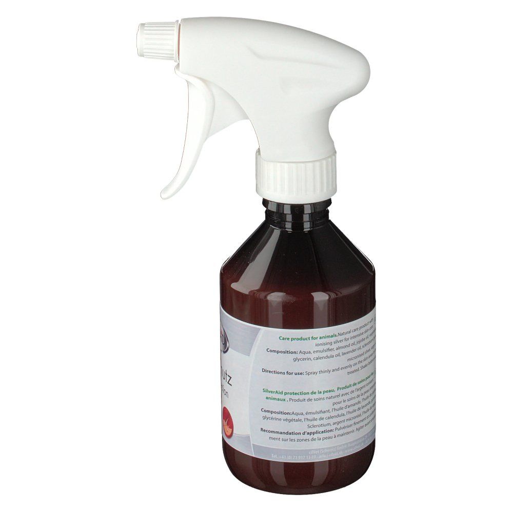 Braune Flasche mit weißem Sprühkopf. Etikett mit Text und Logo. Rückseite mit Text.