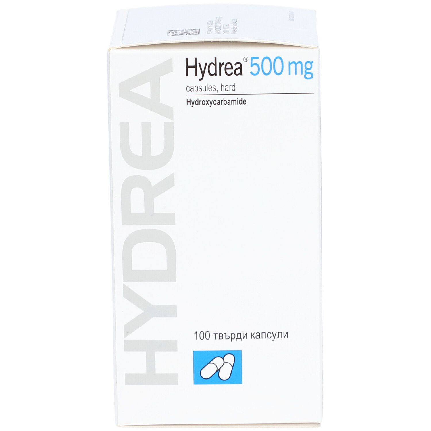 Weiße Schachtel mit HYDREA 500 mg Hartkapseln. Aufschrift: 100 Hartkapseln. Enthält Hydroxycarbamid. Blaue Grafik mit Kapseln.