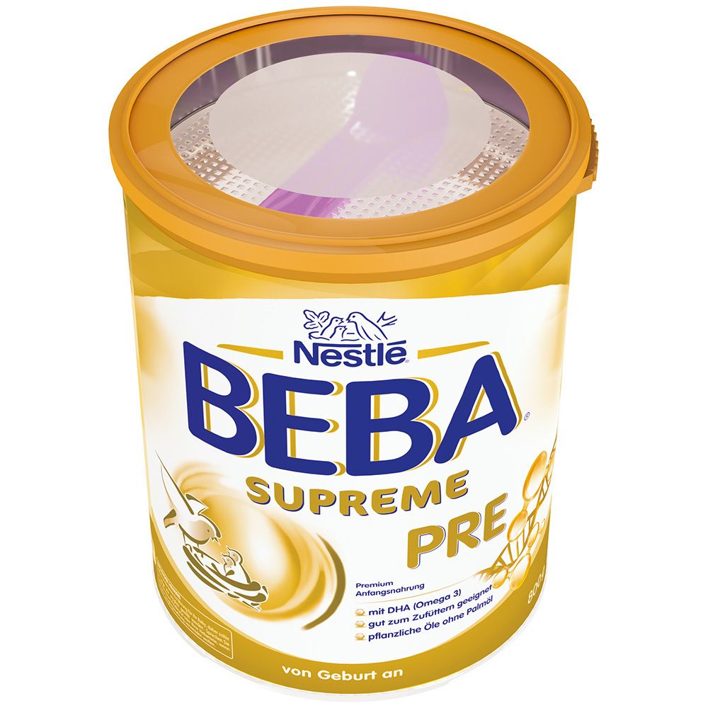 Goldfarbene Dose Nestlé Beba Supreme Pre mit Deckel und Messlöffel. Produktname und Logo sichtbar.