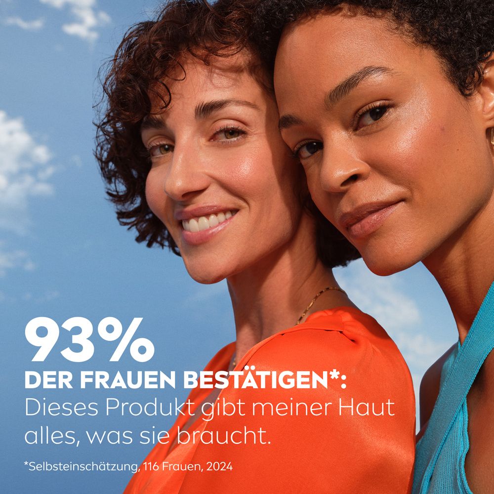 Zwei Frauen lächeln, 93% bestätigen die Wirksamkeit des Produkts.