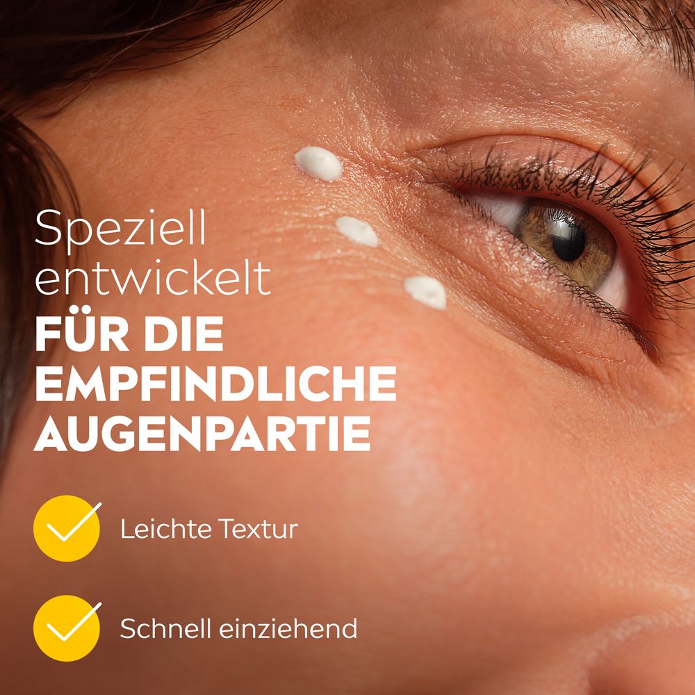 Nahaufnahme eines Auges mit aufgetragener NIVEA Q10 Power Augenpflege.
