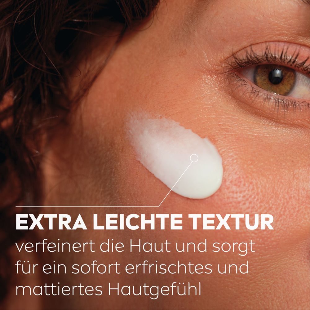 NIVEA Q10 Anti-Falten Porenverfeinerung Tagespflege LSF 15, Seitenansicht des Tiegels.