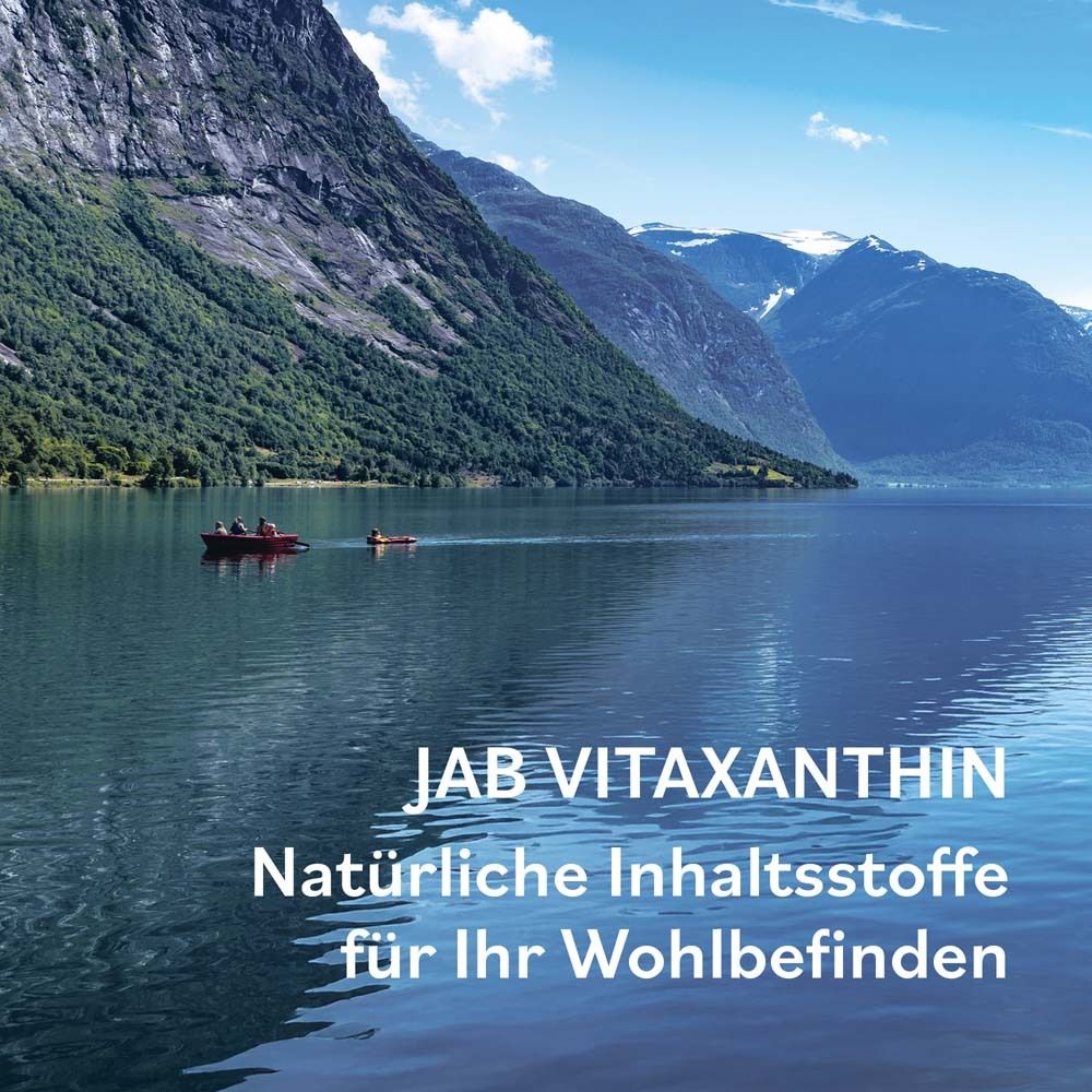 Landschaft mit See und Bergen. Text: JAB Vitaxanthin. Natürliche Inhaltsstoffe für Ihr Wohlbefinden.