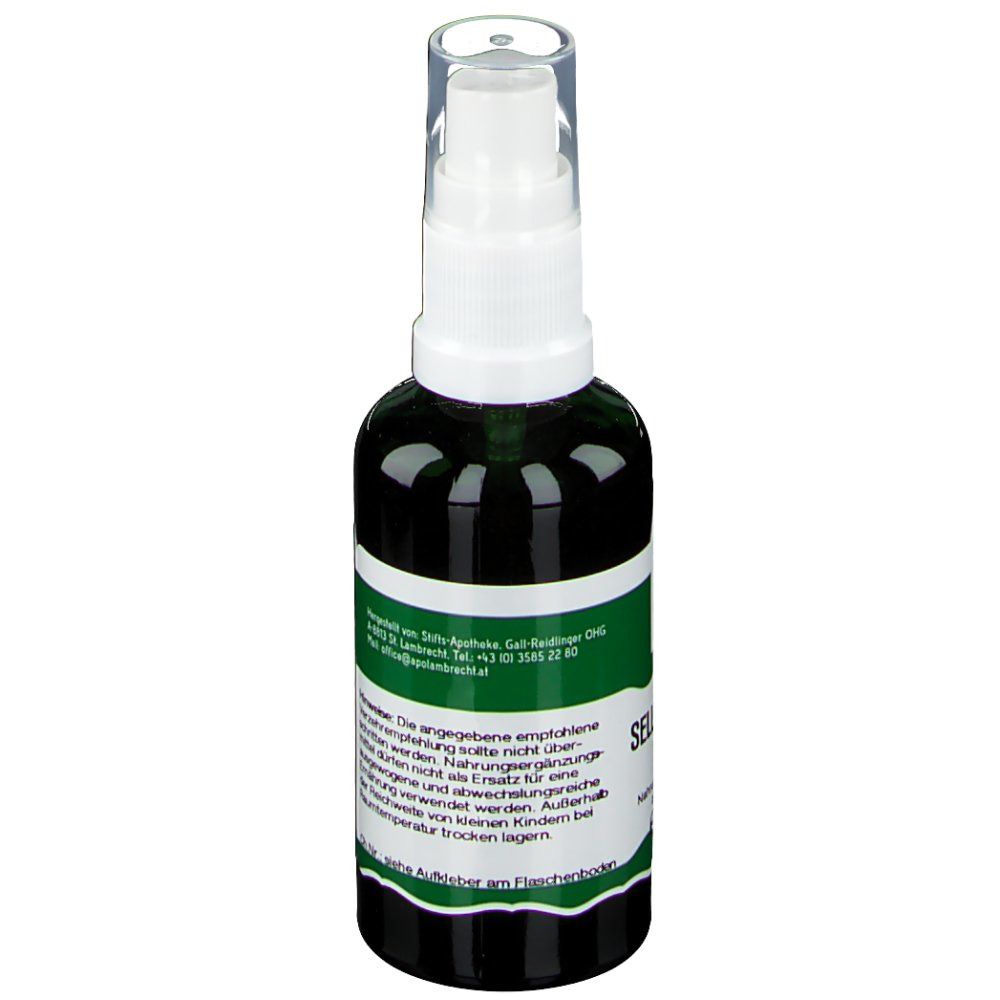 Grüne Glasflasche mit weißem Sprühkopf. Etikett mit Text. Aufschrift: Selleriesamen Spray. Warnhinweise.
