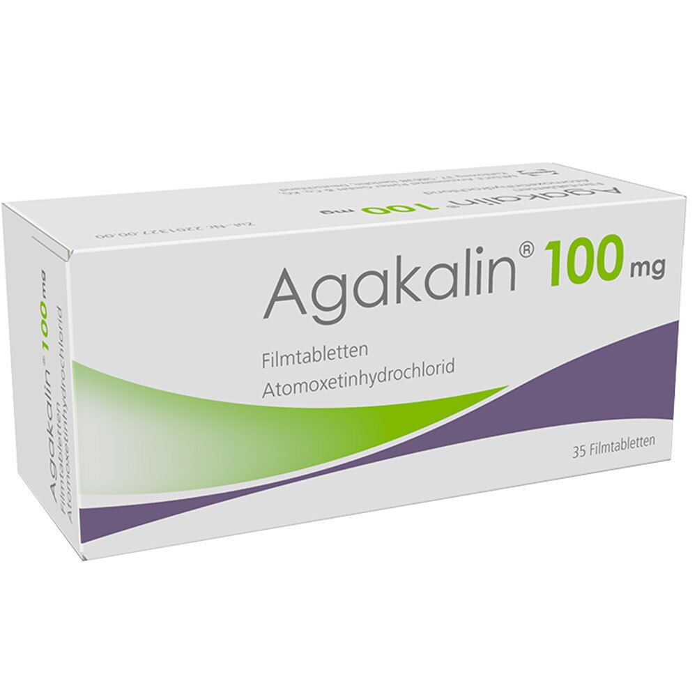 Schachtel mit "Agakalin 100 mg"-Tabletten. Aufschrift: "Atomoxetinhydrochlorid". Verpackung mit grünen und violetten Elementen.
