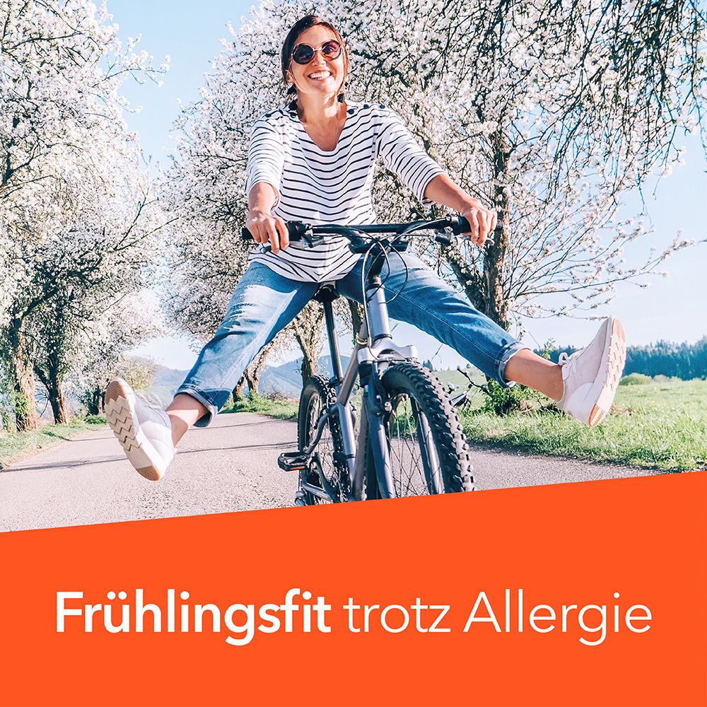 Frau fährt Fahrrad auf einer Straße. Text: Frühlingsfit trotz Allergie.