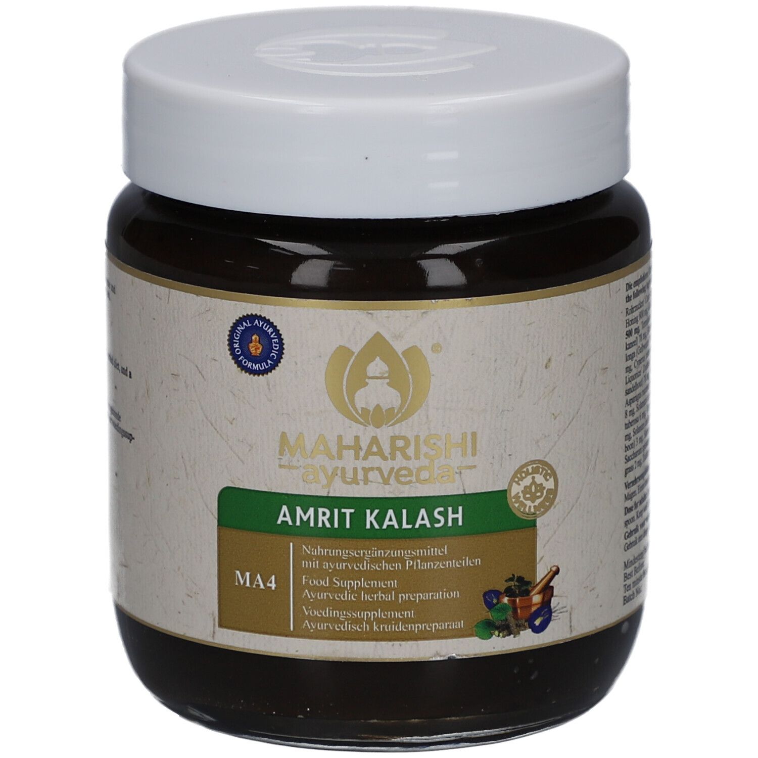Braune Paste in einem Glas mit weißem Deckel. Etikett mit Text: Amrit Kalash, MA4, Maharishi Ayurveda. Siegel.
