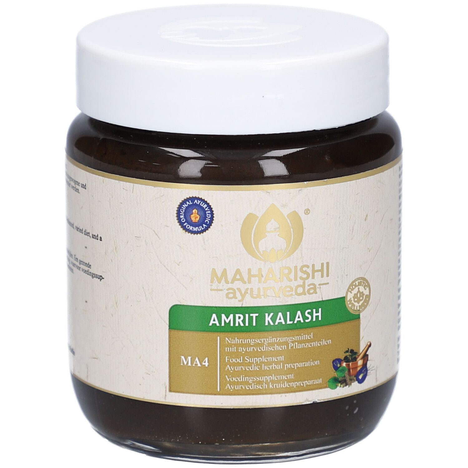 Braune Paste in einem Glas mit weißem Deckel. Etikett mit Text: Amrit Kalash, MA4, Maharishi Ayurveda. Siegel.