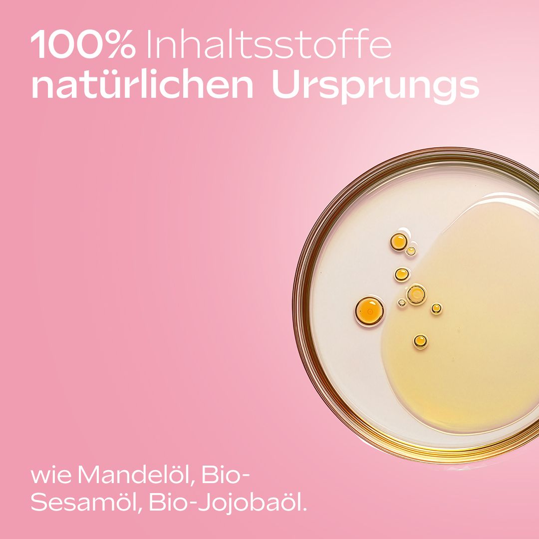 Nahaufnahme von Öl. Text: 100% Inhaltsstoffe natürlichen Ursprungs. Wie Mandelöl, Bio-Sesamöl, Bio-Jojobaöl.