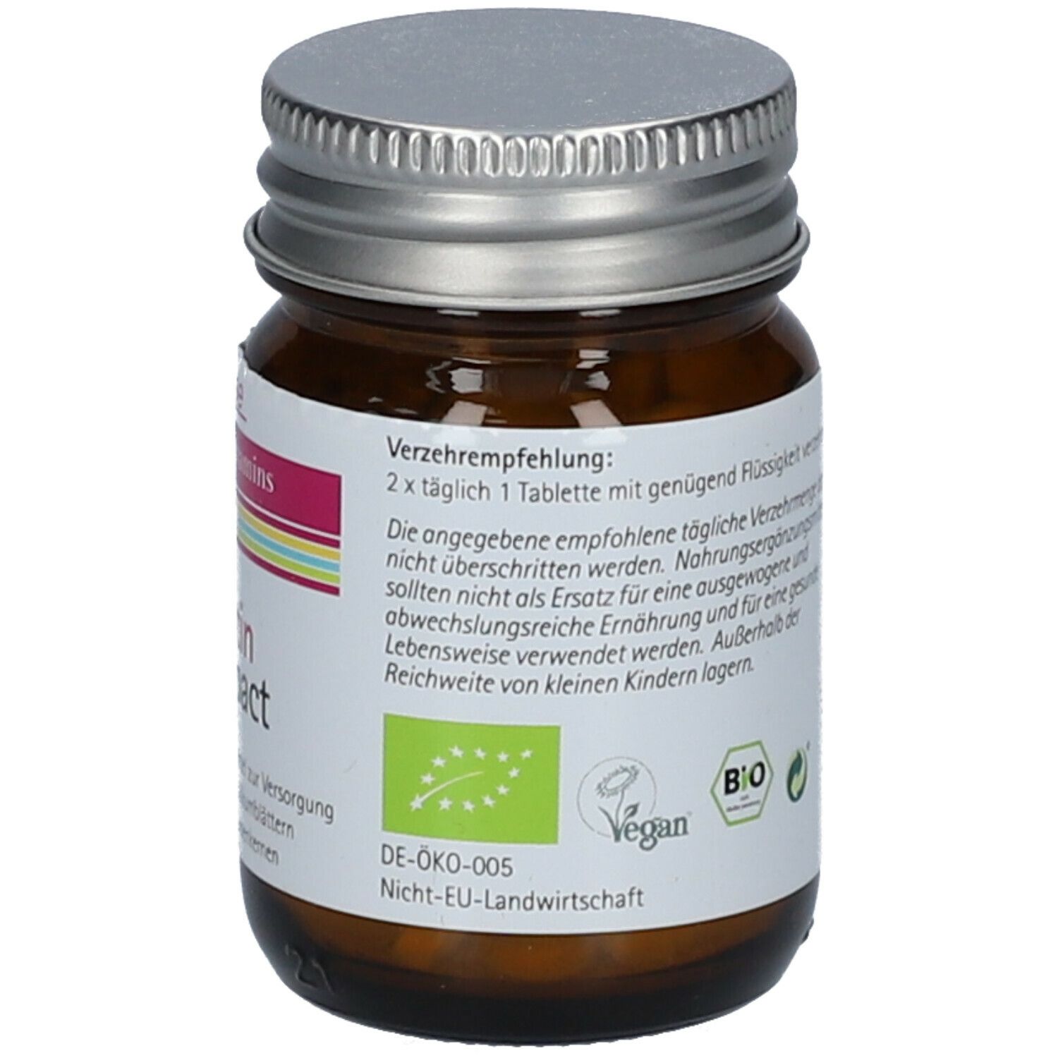 Braune Glasflasche mit silbernem Deckel. Etikett mit Verzehrempfehlung und Bio-Siegel.