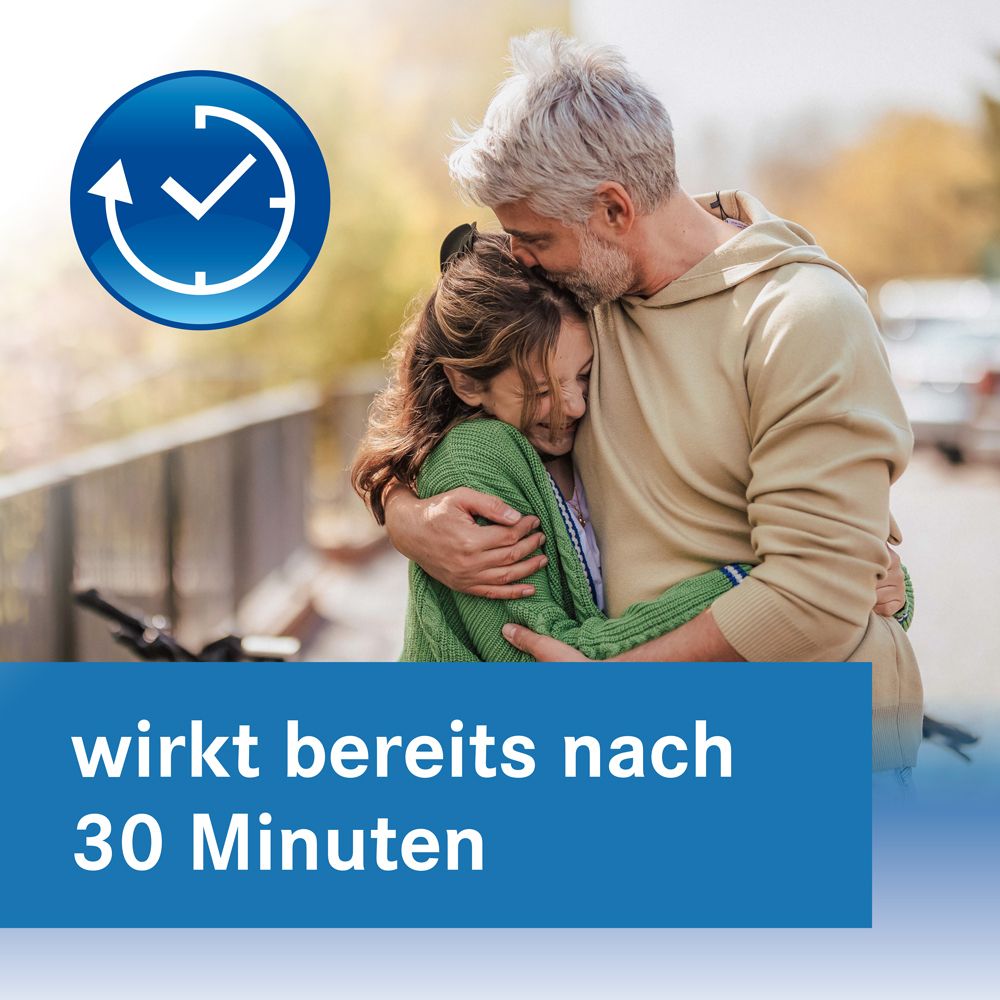 Mann umarmt Kind. Blauer Balken mit Text: wirkt bereits nach 30 Minuten.