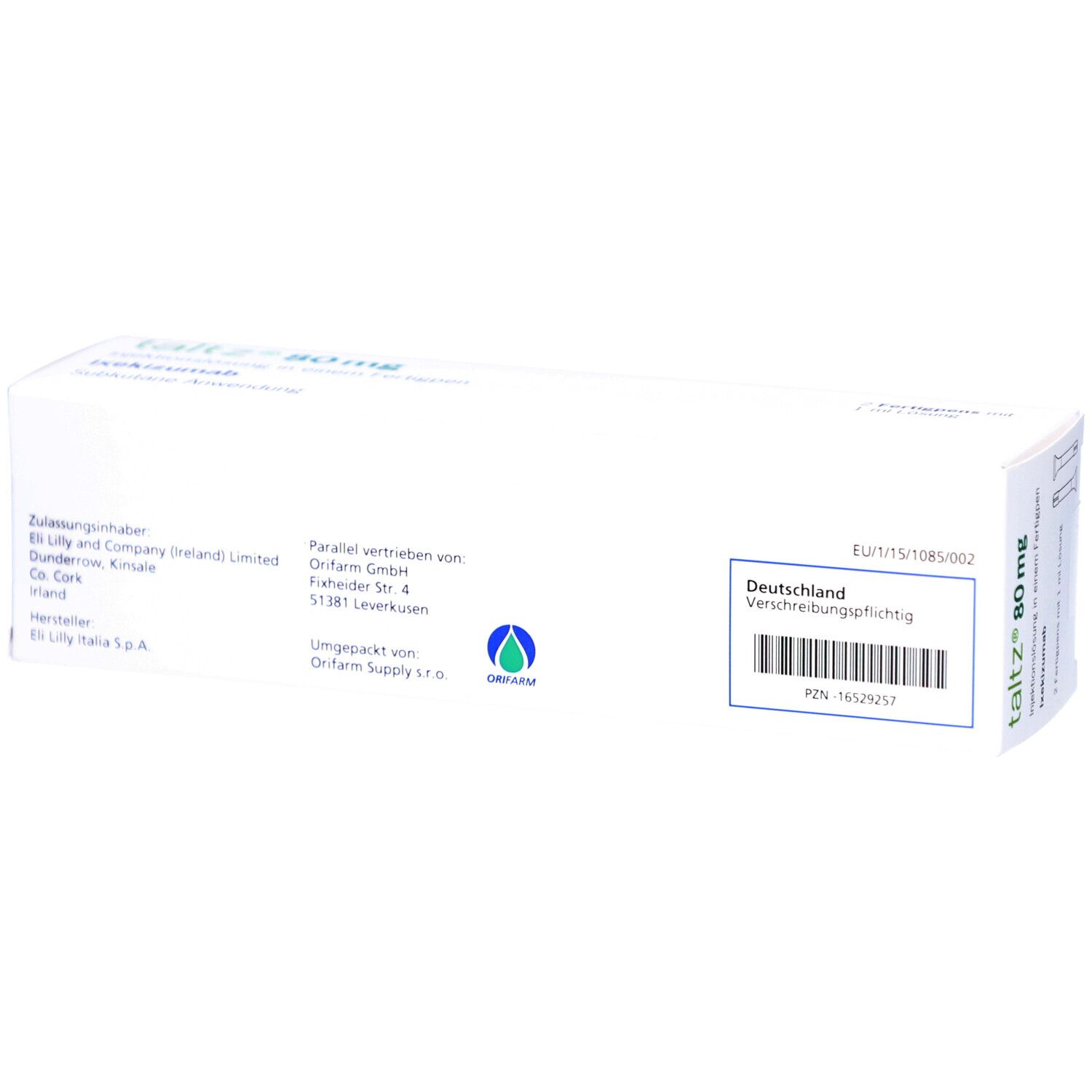 Rückseite der weißen Verpackung mit Text und Barcode. Enthält Informationen zu Hersteller und Vertrieb.