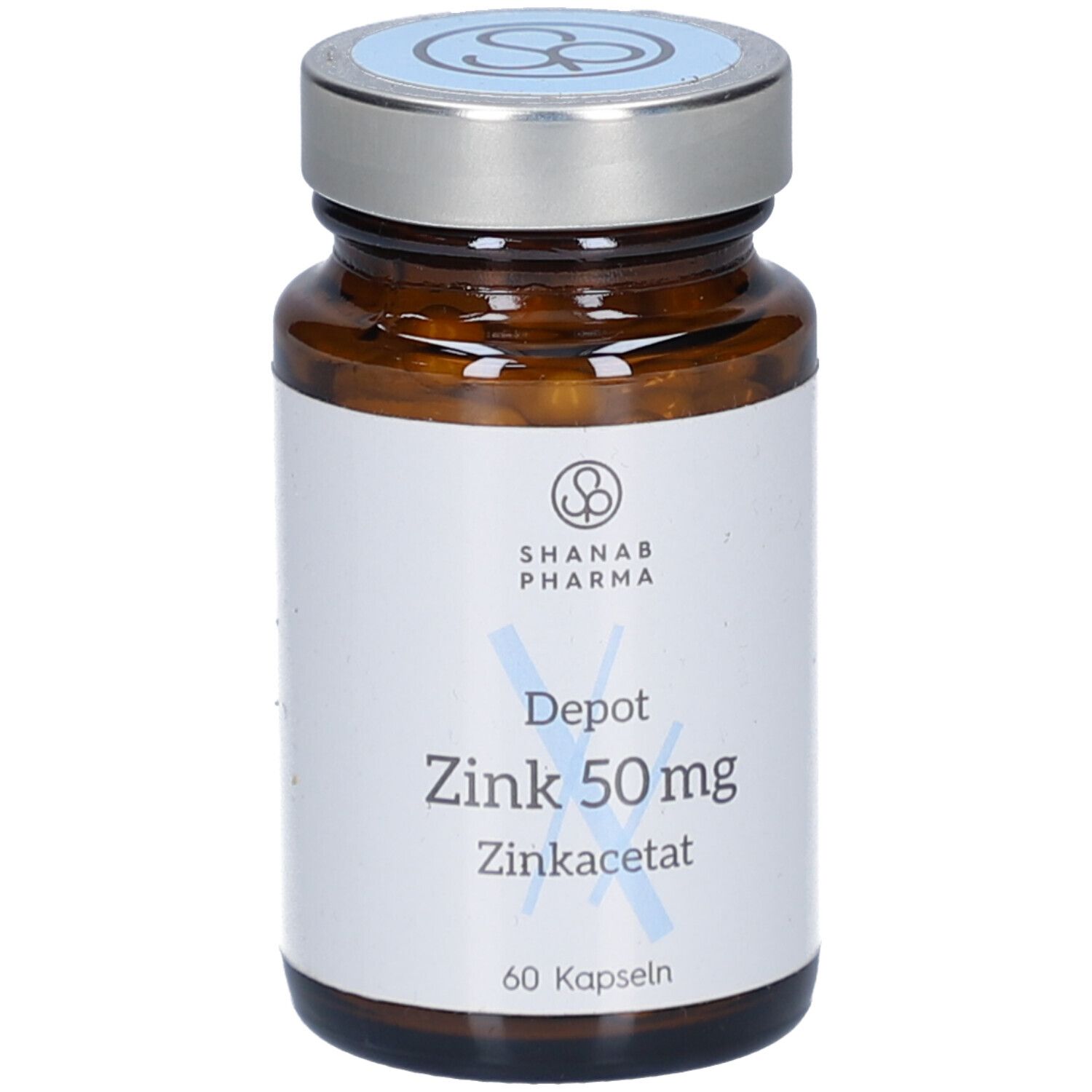 Braune Glasflasche mit silbernem Deckel. Aufkleber mit Produktinformationen: Depot Zink 50mg, Zinkacetat, 60 Kapseln. Marke SHANAB PHARMA.