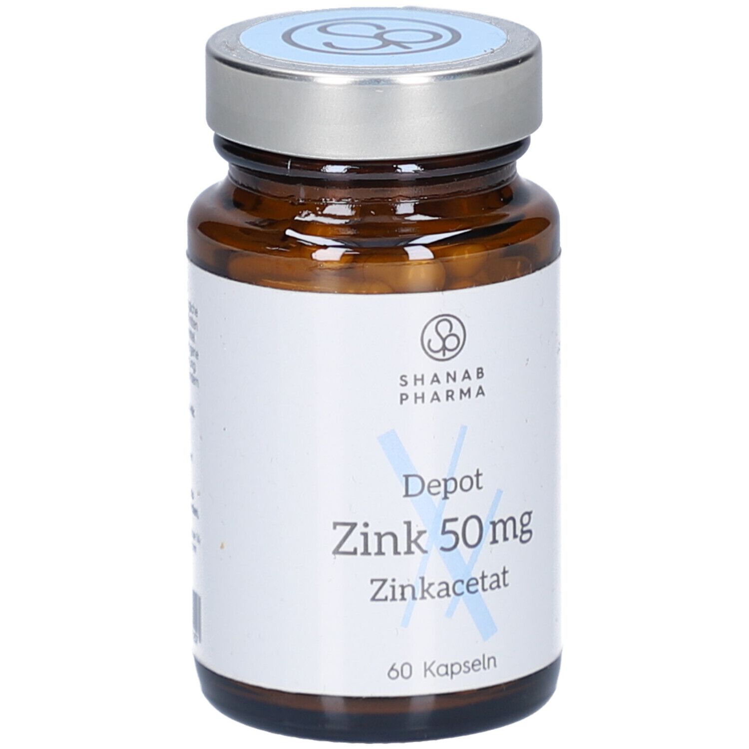 Braune Glasflasche mit silbernem Deckel. Aufkleber mit Produktinformationen: Depot Zink 50mg, Zinkacetat, 60 Kapseln. Marke SHANAB PHARMA.