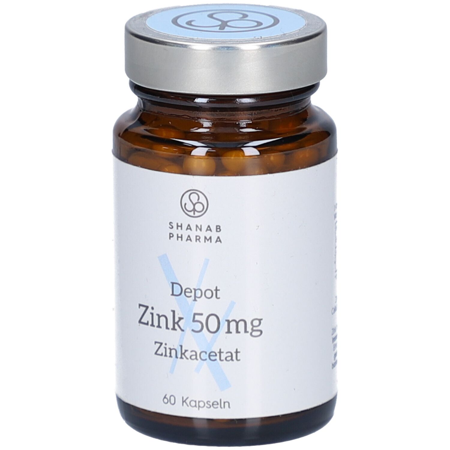 Braune Glasflasche mit silbernem Deckel. Aufkleber mit Produktinformationen: Depot Zink 50mg, Zinkacetat, 60 Kapseln. Marke SHANAB PHARMA.