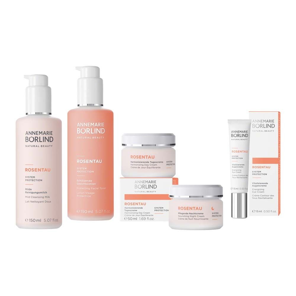 Verschiedene Produkte: Flaschen, Tiegel und Tube. Rosa und weiß.