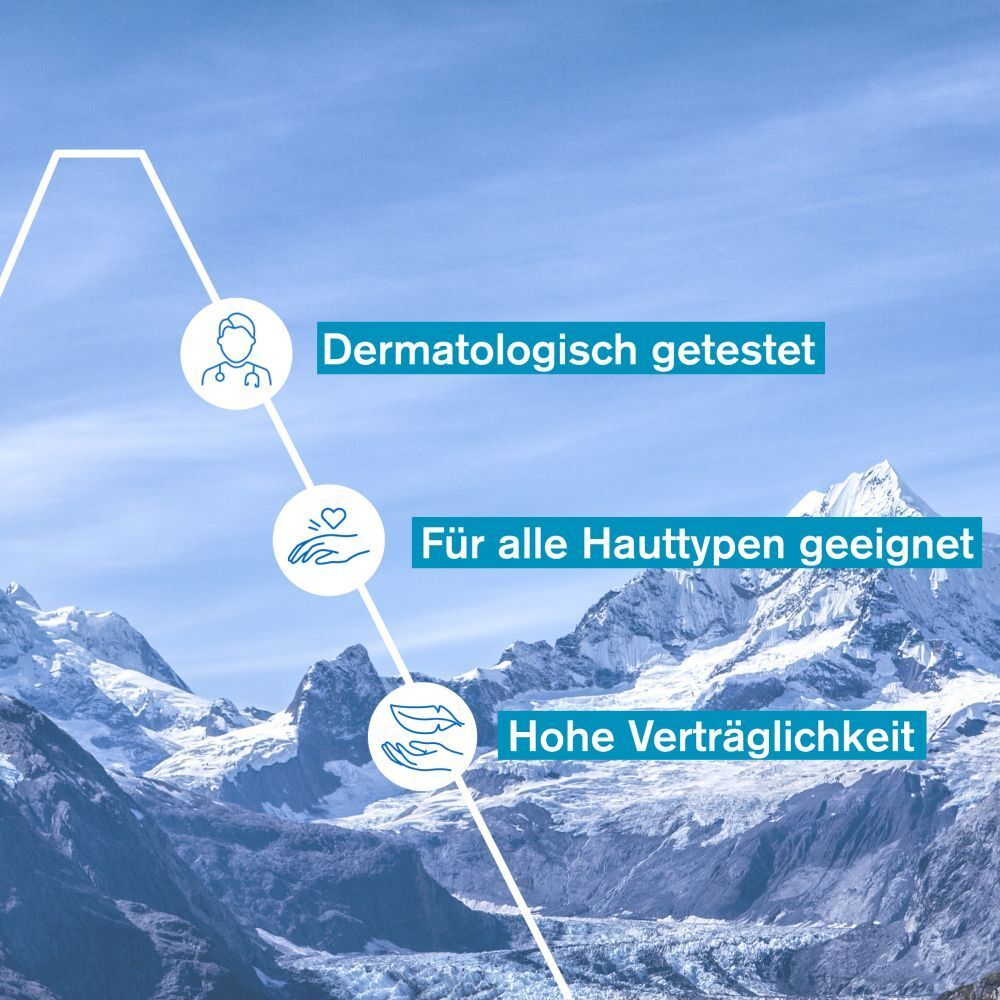 Grafik mit Text: Dermatologisch getestet, für alle Hauttypen geeignet, hohe Verträglichkeit. Hintergrund: Berge.