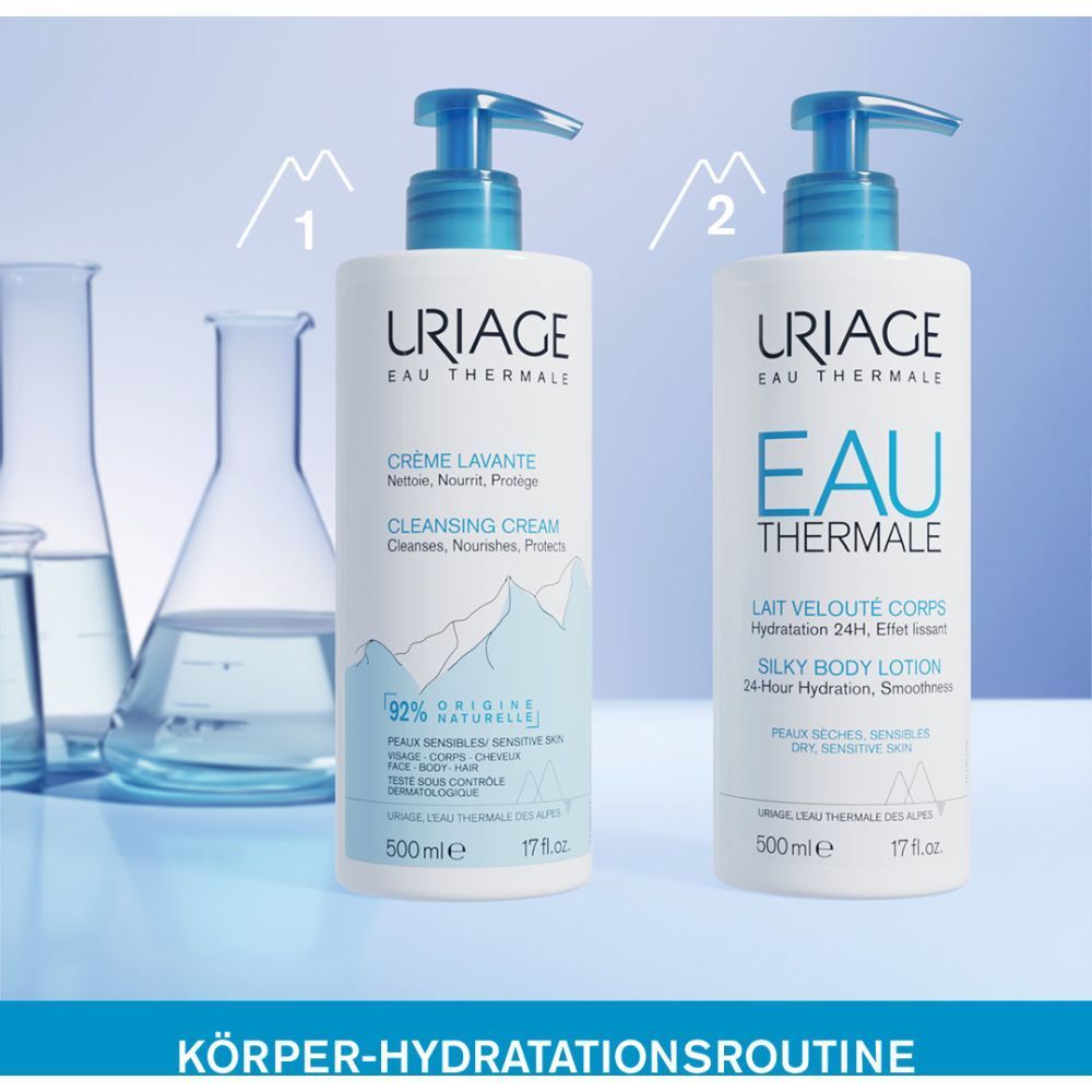 Zwei Flaschen mit URIAGE-Logo. Creme Lavante und Lait Velouté Corps. 500 ml und 17 fl.oz. Körper-Hydratationsroutine.