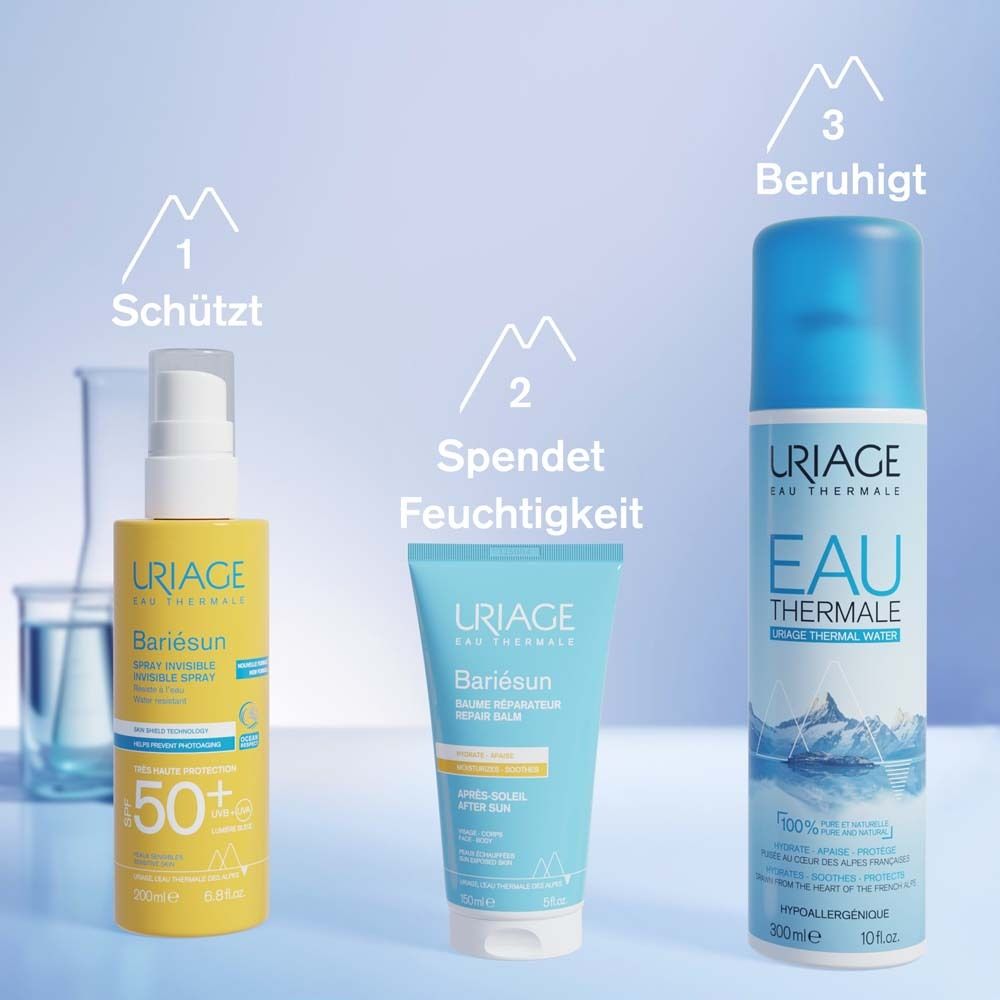 Drei Produkte: Spray, Creme, Thermalwasser. Text: URIAGE, Bariesun, 50+ SPF. Beruhigt. Spendet Feuchtigkeit. Schützt.