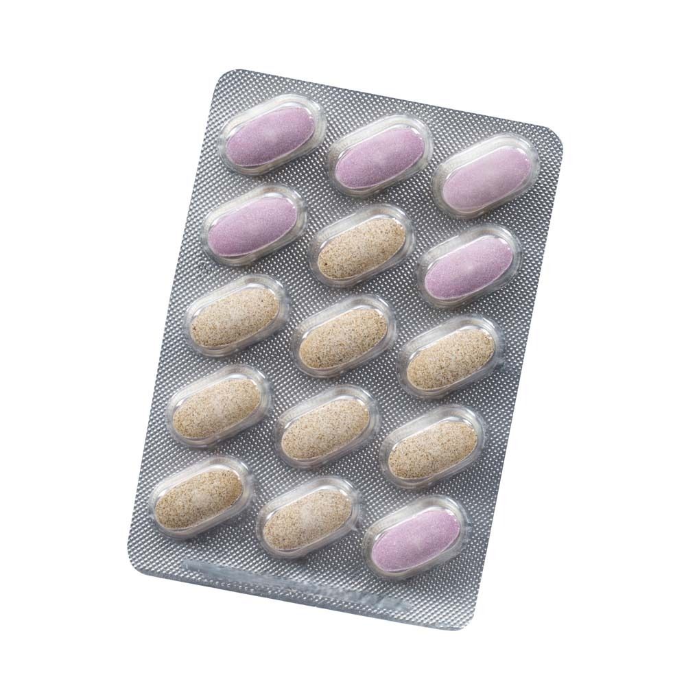 Blisterpackung mit Tabletten. Tabletten in zwei Farben: beige und rosa. 12 Tabletten.