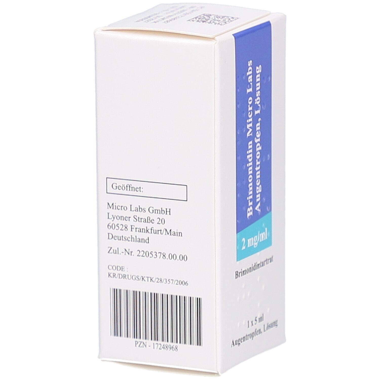 Weiße Faltschachtel mit blauer Banderole. Aufdruck: Micro Labs GmbH, Adresse, Zul.-Nr. Barcode. Logo Micro Labs.