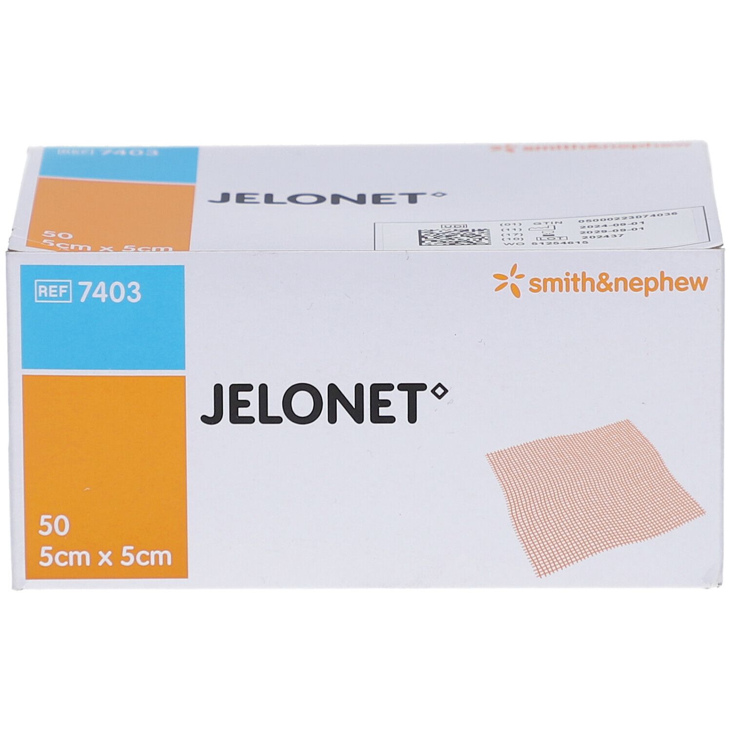 Verpackung mit JELONET Gazeverband. Aufschrift: 50 Stück, 5cm x 5cm. Marke: smith&nephew. Orange und blaue Akzente.