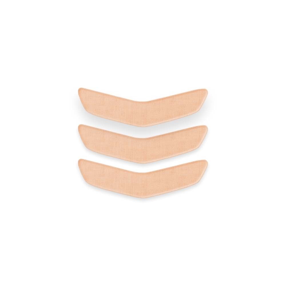 Drei beige Mund-Patches, V-förmig. Auf hellem Hintergrund.