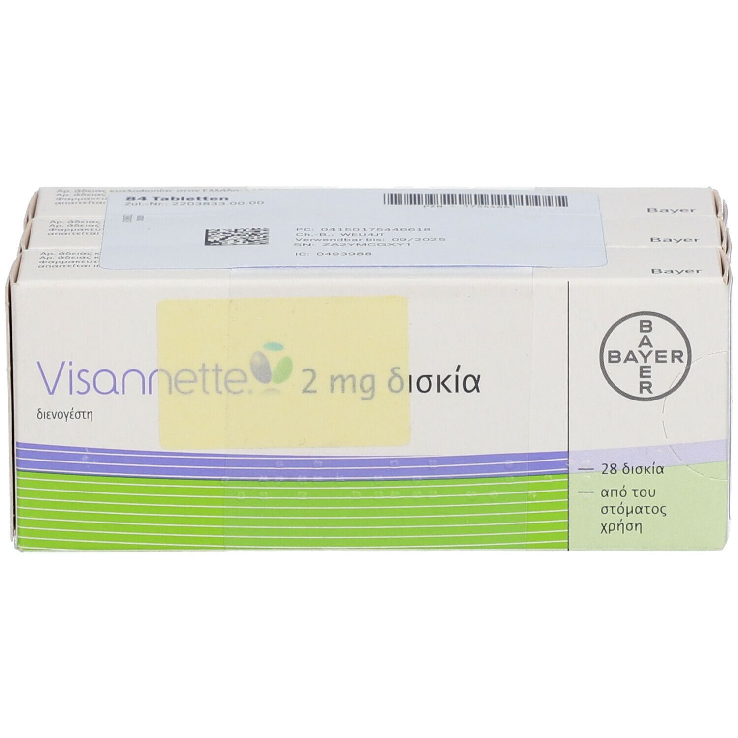 Eine Packung mit weißer und grüner Verpackung. Auf der Verpackung steht "Visannette 2 mg". Das Bayer-Logo ist sichtbar. Text in Griechisch.