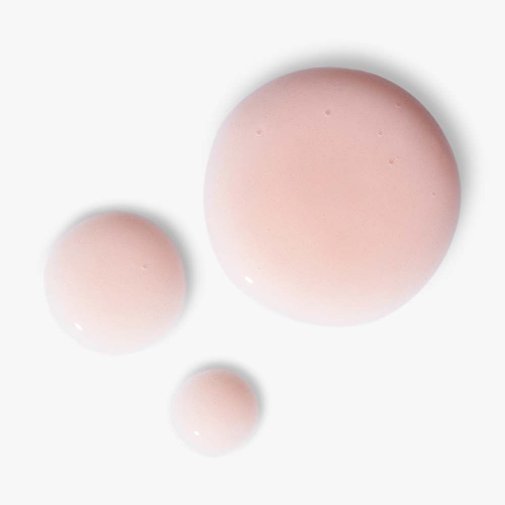 Drei rosa Tropfen. Hintergrund weiß.