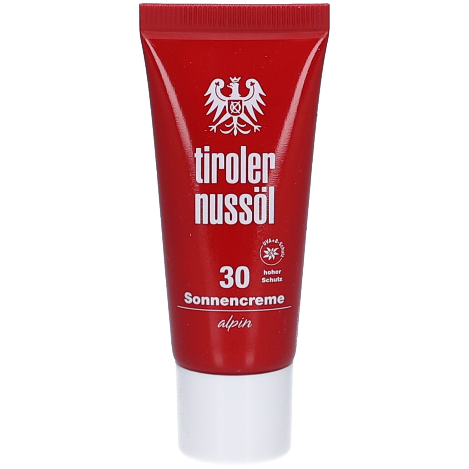 Rote Tube mit weißem Deckel. Aufschrift: tiroler nussöl, 30 Sonnencreme alpin. Logo mit Adler.