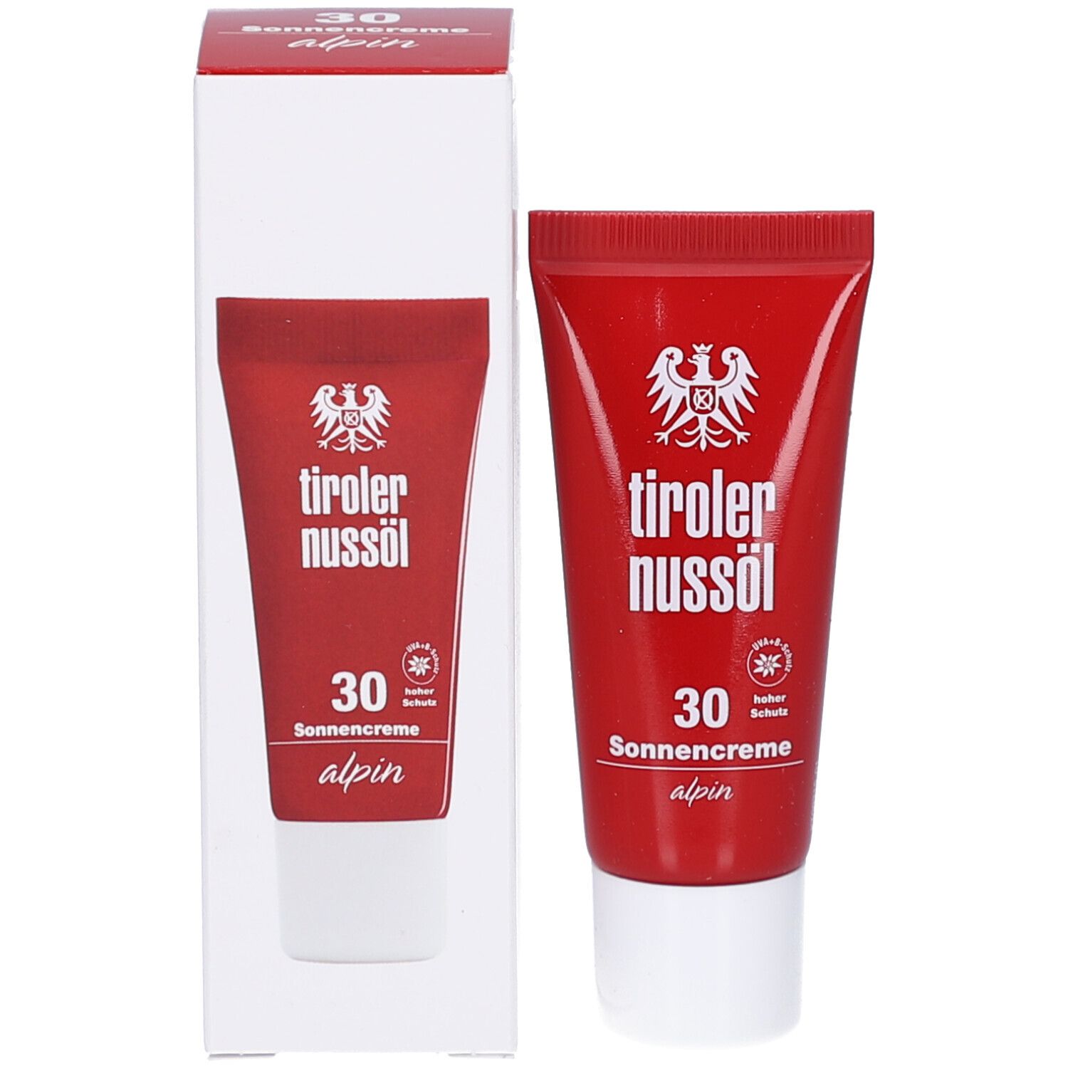 Produkt: Rote Tube und weiße Verpackung. Aufschrift: tiroler nussöl, 30 Sonnencreme alpin. Logo mit Adler.