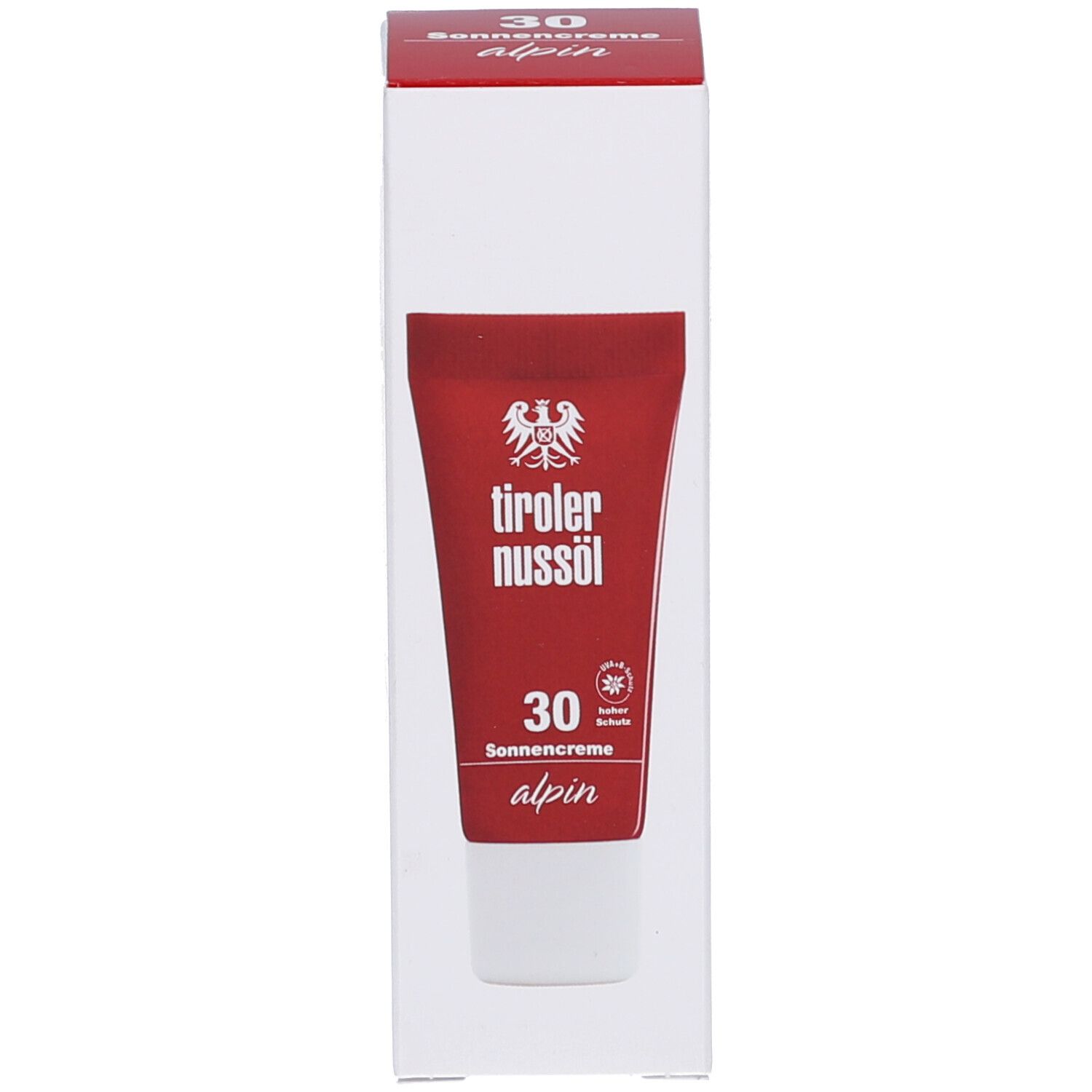 Weiße Verpackung mit roter Tube. Aufschrift: tiroler nussöl, 30 Sonnencreme alpin. Logo mit Adler.