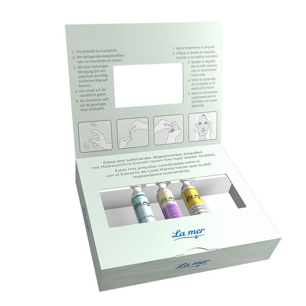 Geöffnete Verpackung mit drei Ampullen. Anleitung mit Illustrationen. Aufschrift "La mer".