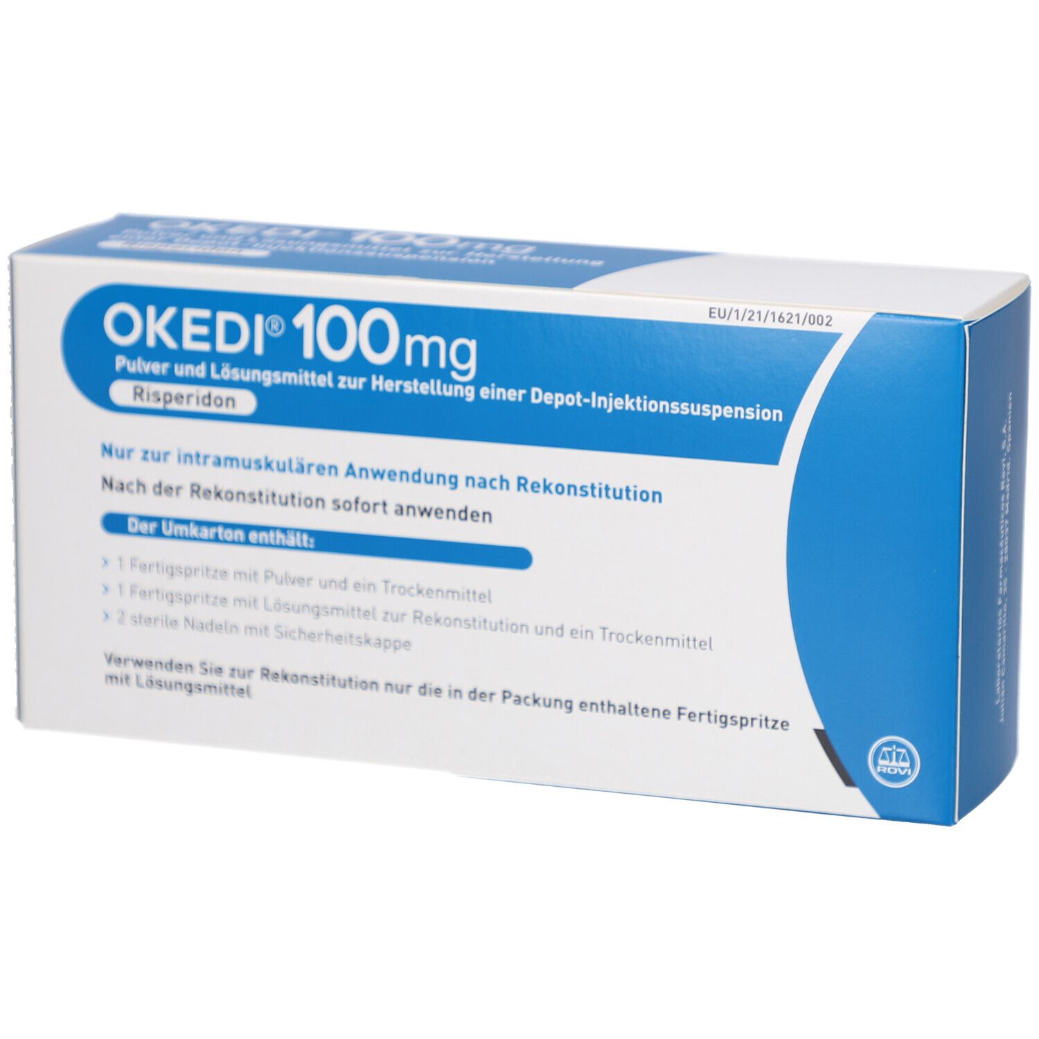 Blau-weiße Faltschachtel mit OKEDI 100mg Aufschrift. Enthält Pulver und Lösungsmittel zur Herstellung einer Depot-Injektionssuspension.
