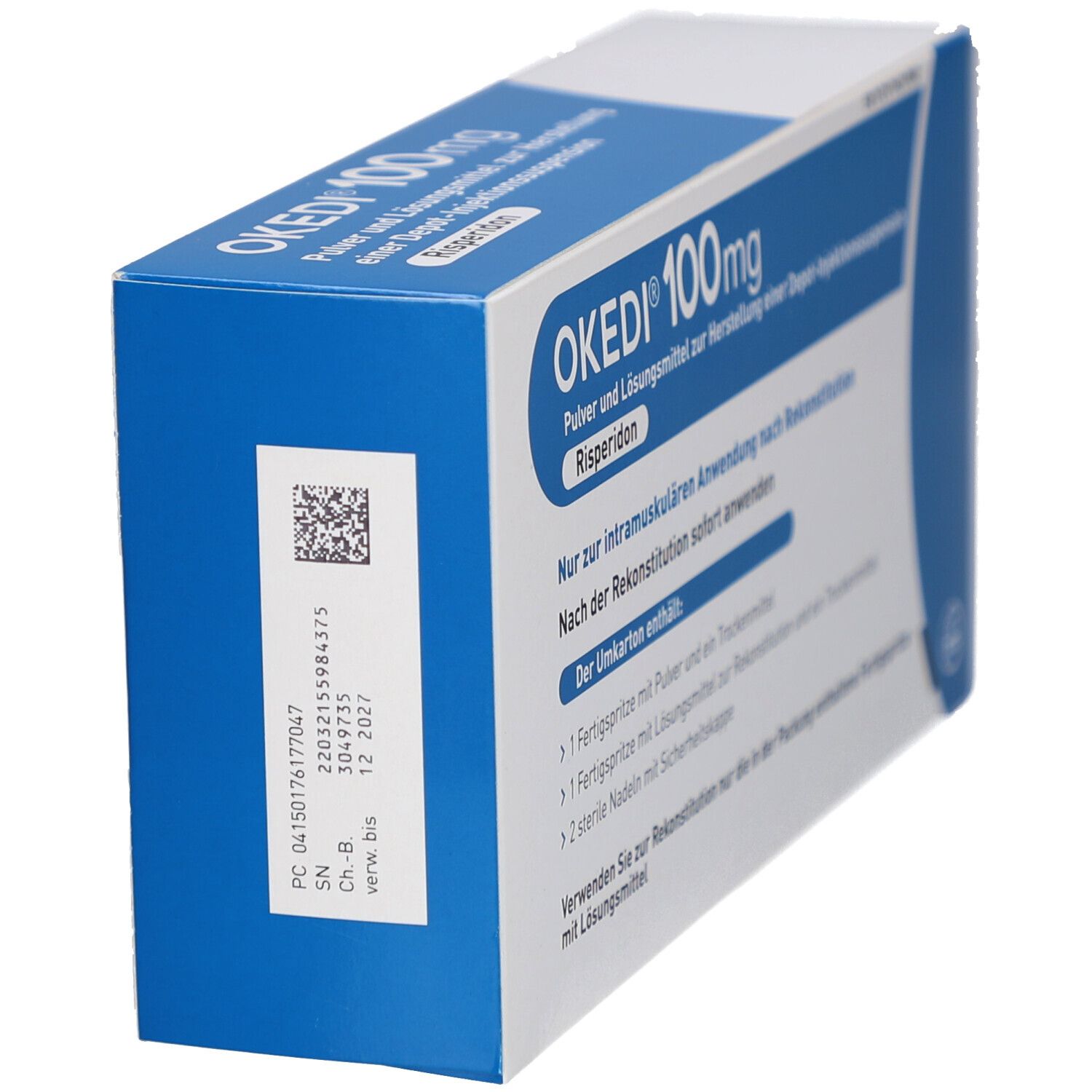 Blaue und weiße Faltschachtel mit OKEDI 100mg Aufschrift. Auf der Seite Barcode und Chargennummer.