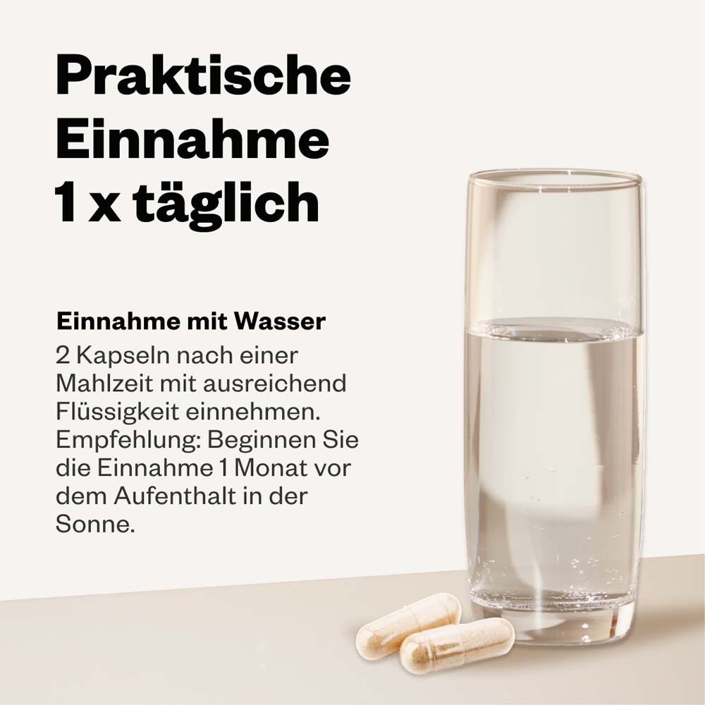 Glas Wasser und zwei Kapseln. Text: Praktische Einnahme 1x täglich. Einnahme mit Wasser.