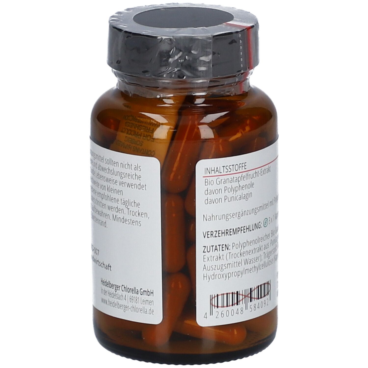 Braune Kapseln in einer braunen Glasflasche. Aufschrift auf dem Etikett: Inhaltsstoffe, Verzehrempfehlung, Zutaten. Barcode und weitere Informationen.